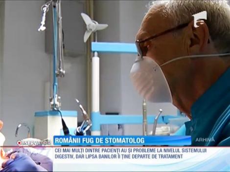 Românii fug de stomatolog