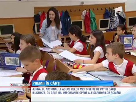 30 de copii cu rezultate remarcabile la şcoală, premiaţi cu câte o carte