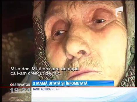 O mamă uitată şi înfometată
