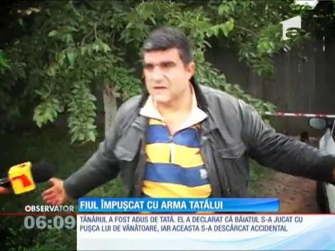 Băiat de 15 ani, împuşcat în cap cu arma tatălui