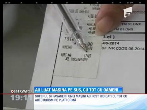 Mașină luată pe sus, cu tot cu oameni