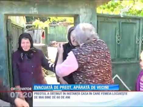 O bătrână, la un pas să fie dată afară din casa de un preot