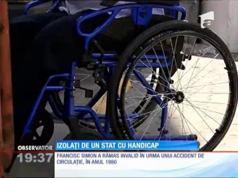 Persoanele cu handicap, izolate de un sistem bolnav