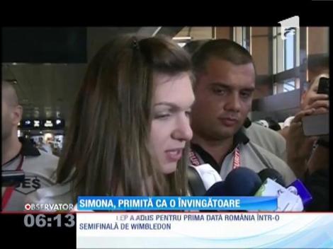 Simona Halep a fost primită pe aeroportul Otopeni ca o învingătoare
