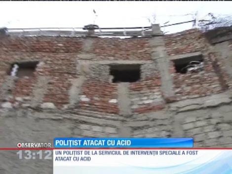 Poliţist atacat cu acid sulfuric