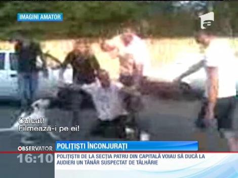 IMAGINI ŞOCANTE / S-a tras cu pistolul pe o stradă din Capitală, ziua în amiaza mare