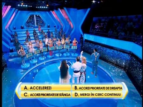 Rândul 4: Ce trebuie să faci atunci când te apropii de o intersecţie marcată cu semnul de sens giratoriu?