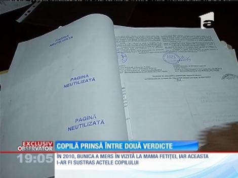 Copila prinsă între două verdicte
