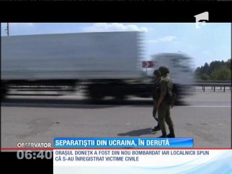Convoiul cu ajutoare umanitare trimis de Rusia în estul Ucrainei a ajuns la 20 de kilometri de graniţă