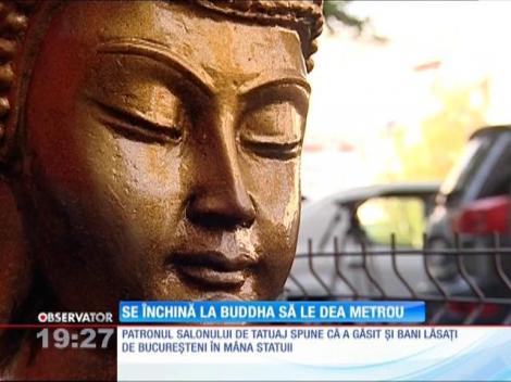 Loc de pelerinaj în curtea unui bloc din cartierul bucureştean Militari. O statuie a lui Buddha a apărut peste noapte