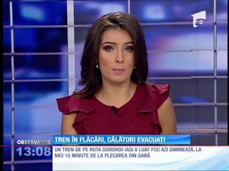 Tren în flăcări, călători evacuaţi