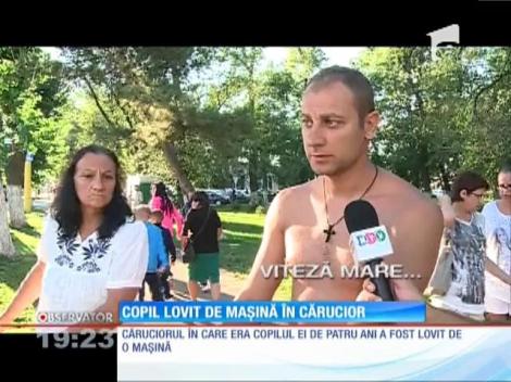Copil în cărucior, lovit de maşină