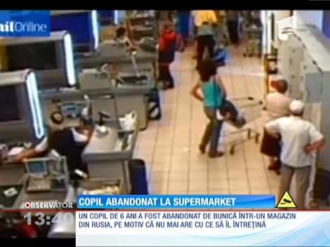 Copil abandonat într-un supermarket din Rusia