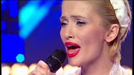 "Once Upon A December" (varianta &icirc;n limba rusă). Vezi interpretarea Evgheniei Burnusuz, la X Factor!