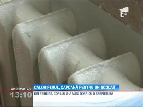 Caloriferul, capcană pentru un școlar