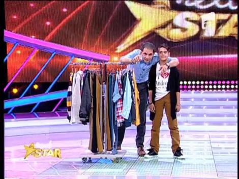 Andreas Gheorghe primeşte haine şi un curs gratuit de canto