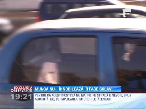 Sute de copii cerşesc prin intersecţiile din marile oraşe