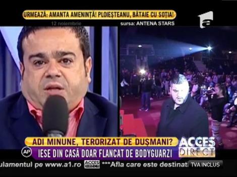 Adi Minune iese din casă flancat de bodyguarzi