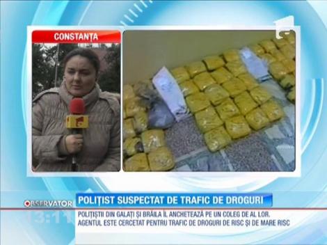 Poliţist suspectat de trafic de droguri