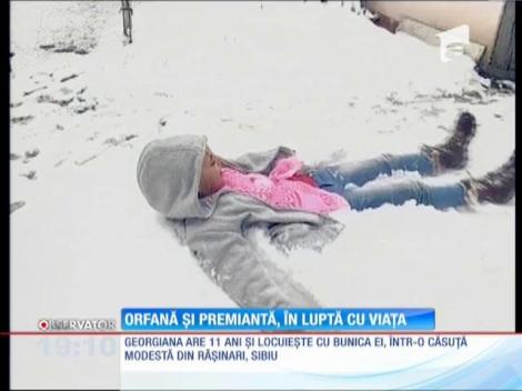 Orfană și premiantă, în luptă cu viața
