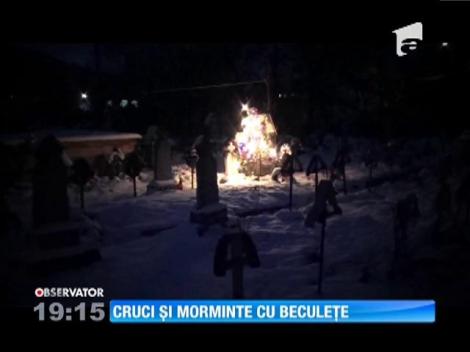 Cruci şi morminte cu beculeţe