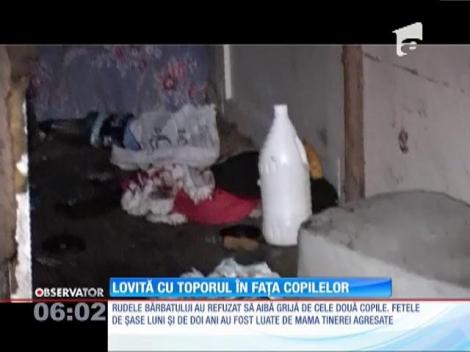 O tânără din județul Maramureș a fost mutilată cu un topor în fața copilelor sale