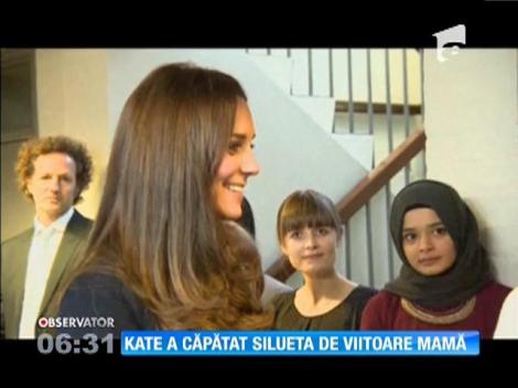 Kate Middleton a căpătat silueta de viitoare mamă