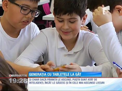 Generația cu tabletele la gât