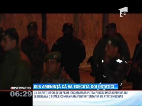 ISIS ameninţă că va executa doi ostatici