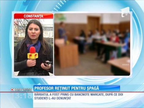 Profesor reţinut pentru şpagă