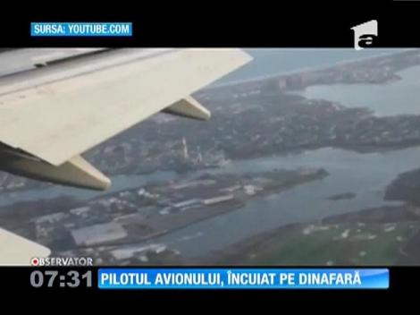 Pilotul avionului, încuiat pe dinafară