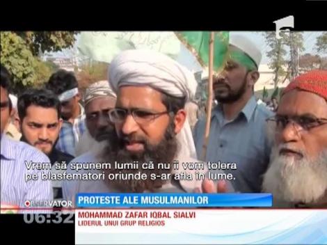 Mii de musulmani au protestat faţă de caricaturile cu profetul Mahomed