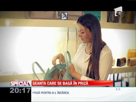 Un designer român a creat poşeta cu încărcător şi lanternă