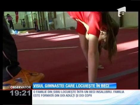 Visează să devină a doua Nadia Comăneci! Are 8 ani şi locuieşte cu părinţii şi fratele într-un beci