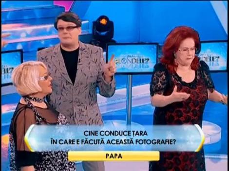 Runda 2: Cine conduce ţara în care e făcută această fotografie?