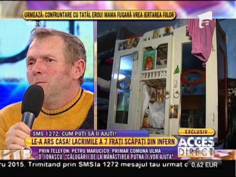 Familia rămasă fără casă, ajutată de călugării de la Mănăstirea Putna