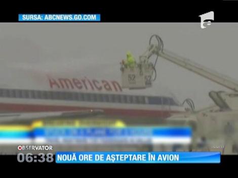 9 ore de așteptare în avion