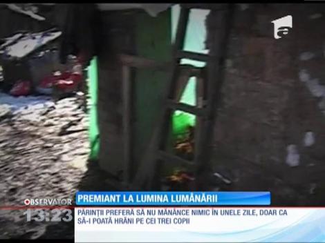 Premiant la lumina lumânarii