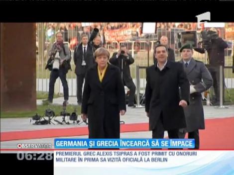 Germania și Grecia încearcă să se împace