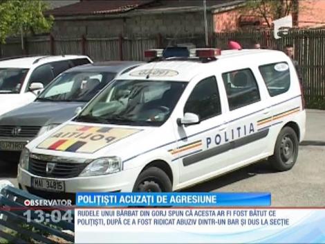 Poliţişti acuzaţi de agresiune