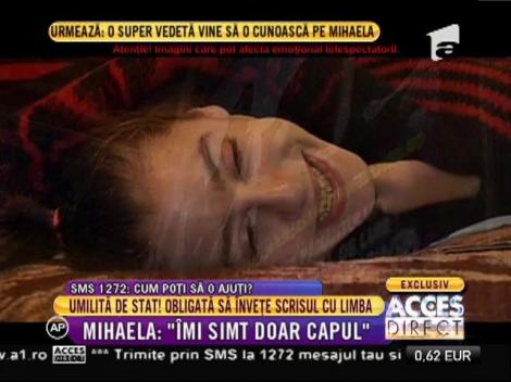 O tânără paralizată a învăţat să scrie cu limba