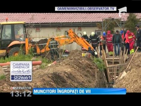 Muncitori îngropați de vii