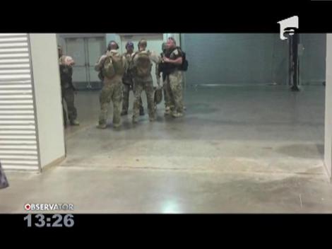 Atac armat în timpul unei expoziţii de caricaturi cu profetul Mahomed