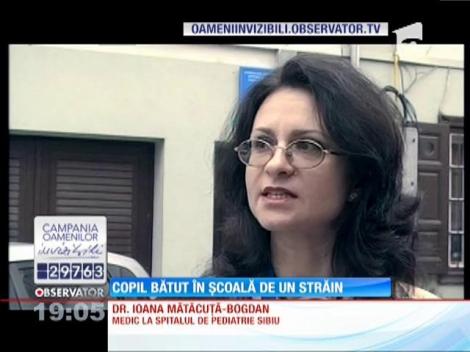 Copil bătut în şcoală de un străin