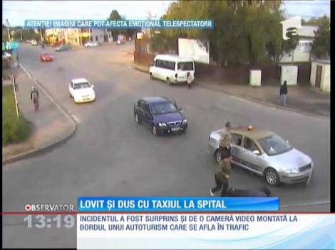 Lovit şi dus cu taxiul la spital
