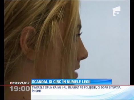 Imagini scandaloase şi circ în direct la Râmnicu Vâlcea! Trei poliţişti au luat pe sus două tinere, de pe stradă