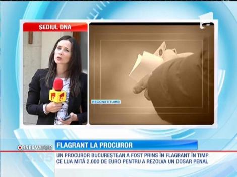 Un procuror a fost prins în flagrant luând mită