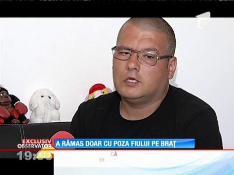 A rămas doar cu poza fiului pe braț!