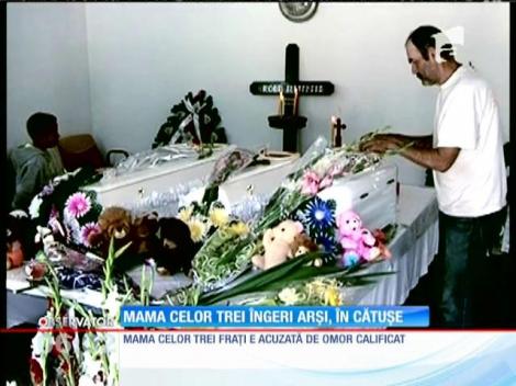 Femeia care şi-ar fi încuiat copiii în casă şi i-ar fi lăsat să ardă de vii a ajuns după gratii
