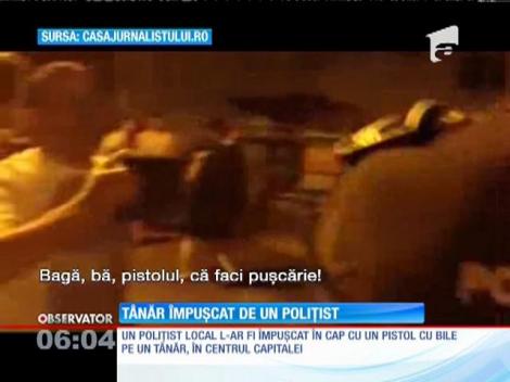 Scandal cu focuri de armă în Capitală! Un poliţist local a împuşcat un tânăr în cap